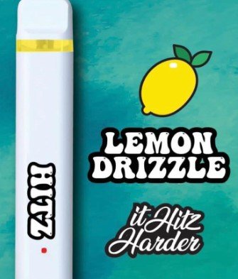 Hitz Lemon Drizzle Disposable held in hand showing compact portable design Hitz Lemon Drizzle Disposable 2g vape with vibrant lemon flavor packaging